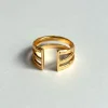 Anillo Dorado Ajustable Con Diseño De Tres Argollas
