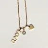 Collar Dorado Con Colgante Triple Love