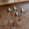 Set De 4 Tenedores De Bronce Con Diseño De Mariposa
