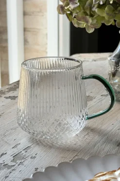 Vaso De Cristal Con Detalles Tallados Y Asa De Color